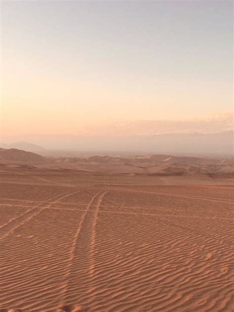 Sunset at dunes of Huacachina // Peru