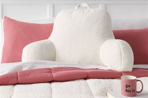 This $18 Bed Rest Pillow Keeps Me Comfortable for Hours While Lounging