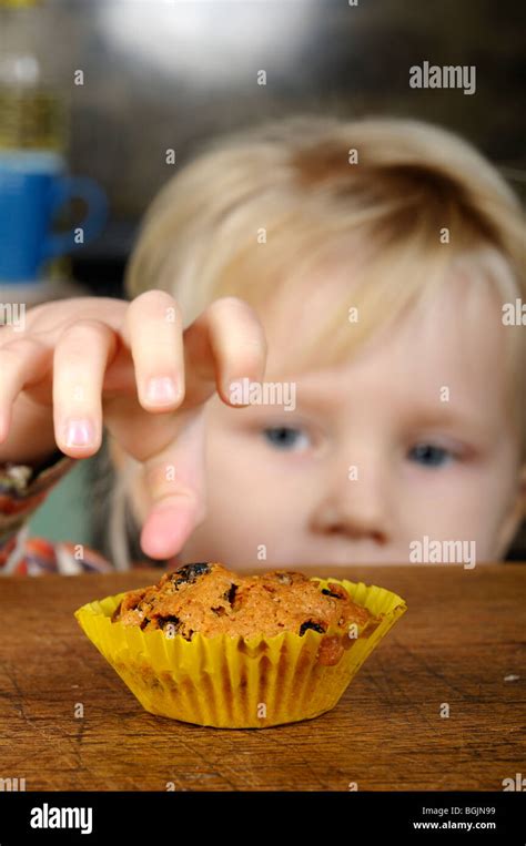 Girl stealing cake table hi-res stock photography and images - Alamy