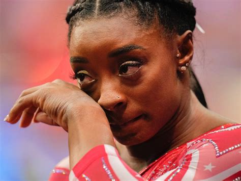 A tearful Simone Biles takes fans behind-the-scenes of her struggle ...