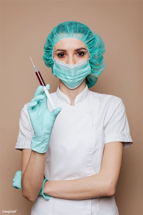 Female scientist holding a blood sample in a syringe | free image by rawpixel.com / Karolina ...