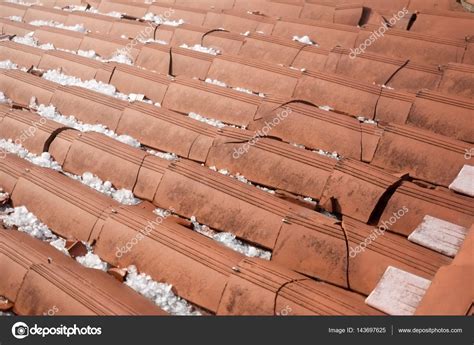 Damaged roof tiles Stock Photo by ©stocco.claudio.libero.it 143697625