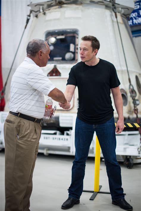 File:Charles Bolden congratulates SpaceX CEO and Chief Designer Elon Musk in front of the ...