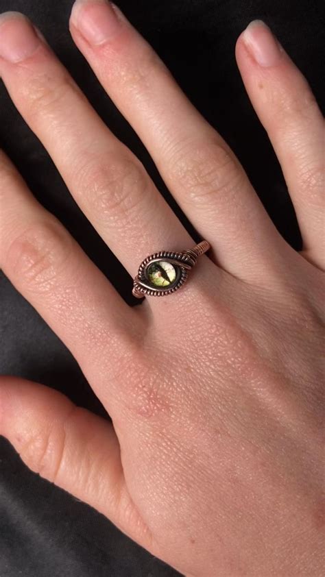 The Dragon of Nature Eye Ring is available in our shop! Link in bio | Wire jewelry, Diy wire ...