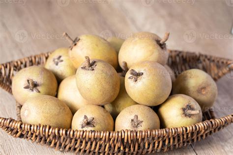 Fresh sapodilla in basket tropical fruit evergreen tree and sweet taste ...