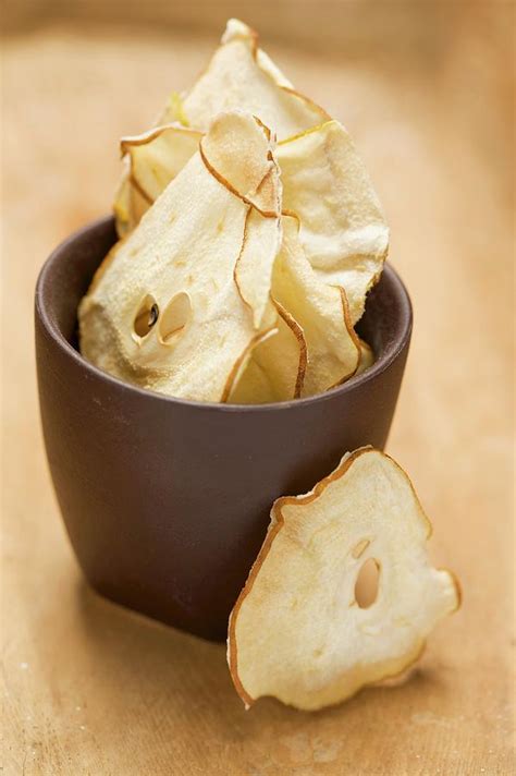 Dried Pear Slices In A Pot Photograph by Eising Studio - Food Photo and ...