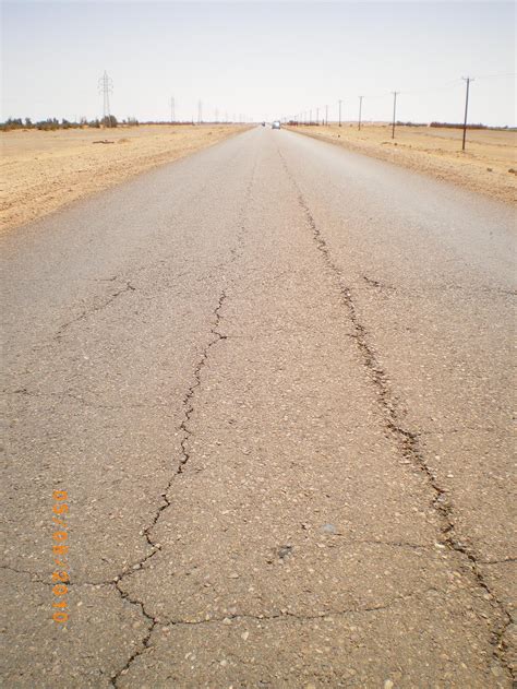 What are the types of cracking in roads?