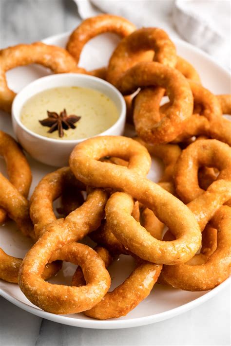 Cuban Bunuelos with Cinnamon-Anise Syrup - A Sassy Spoon