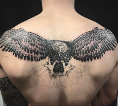 Let that eagle spread the wings! Eagle back tattoo #tattoo #esgletattoo ...