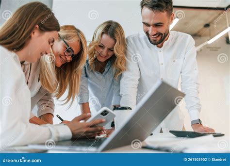 Working by Laptop Together. Group of Professional Business People is in the Office Stock Photo ...