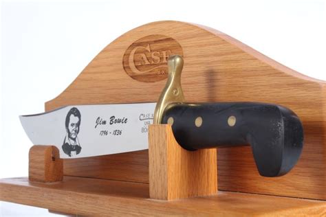 Lot - Case XX Bowie Knife with oak wall display rack