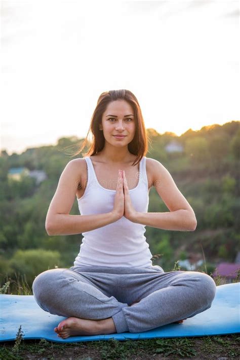 Beautiful Girl Meditating at Sunset Sitting with Folded Hands Stock Photo - Image of relax ...