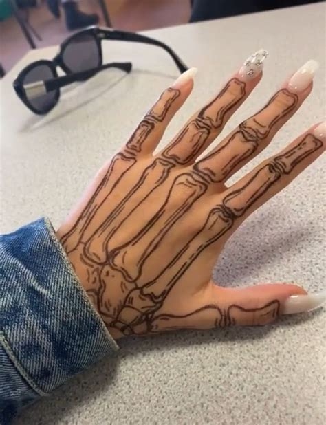 𝐇𝐄𝐑 // 𝐁.𝐄 | Skeleton hand tattoo, Hand tattoos, Sharpie tattoos