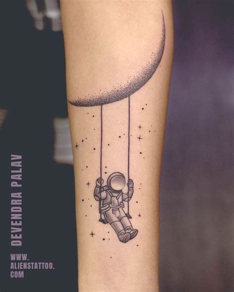 astronaut-swinging-on-a-swing-hanging-from-the-moon-small-space-tattoos-forearm-tattoo | Galaxy ...