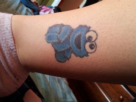 my cookie monster tattoo! | Monster tattoo, Tribal dragon tattoos, Disney tattoos