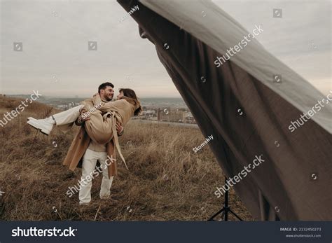 Man Holds Girl His Arms Hugs Stock Photo 2132450273 | Shutterstock