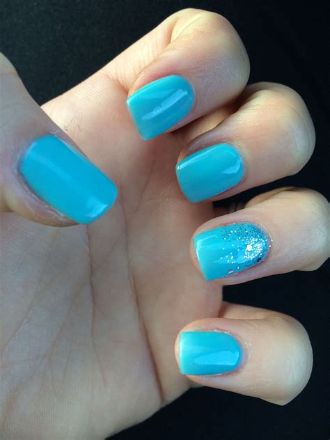 Tiffany blue nails with silver ombre glitter | Blue ombre nails ...