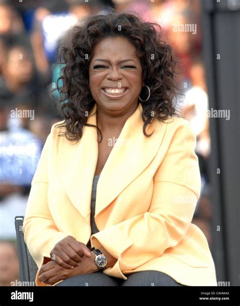 Dec 09, 2007 - Columbia, South Carolina, USA - OPRAH WINFREY takes the stage with over 29,000 in ...