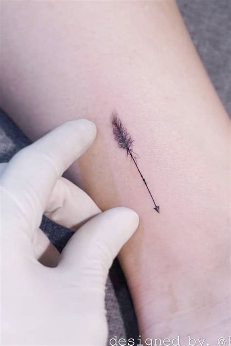 18 Amazing And Unforgettable Arrow Tattoo Designs