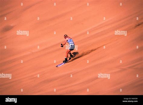 Surfing sand dunes, Namibia Stock Photo - Alamy