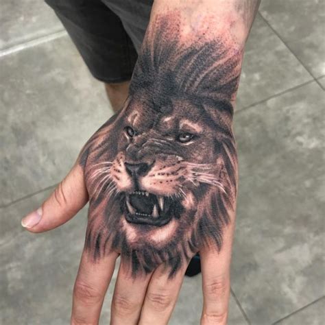 Roaring Lion on Hand Tattoo