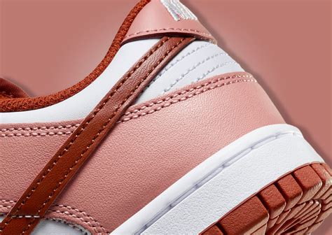 The Women's Exclusive Nike Dunk Low Red Stardust Releases Holiday 2023 - Sneaker News