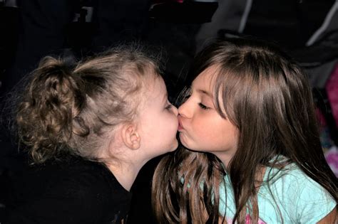 Young Sisters Kissing Free Stock Photo - Public Domain Pictures