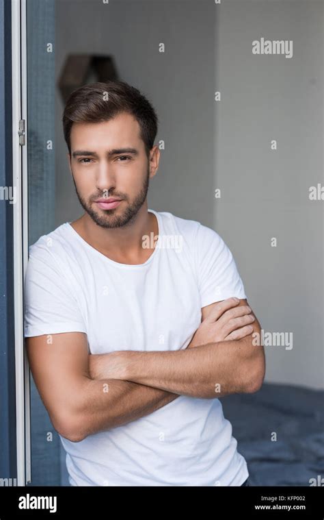 man posing with arms crossed Stock Photo - Alamy