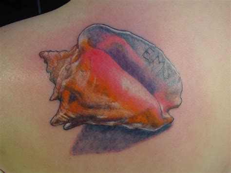 Beautiful Conch Tattoo On Back Shoulder