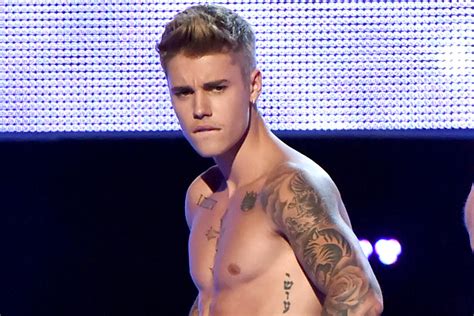 Justin Bieber Gets Chest Tattoos | Teen Vogue