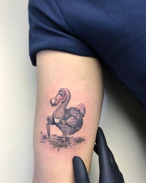 Dodo tattoo on the right inner arm. Artwork by Dominic | Tattoo designs, Tattoos, Cool tattoos