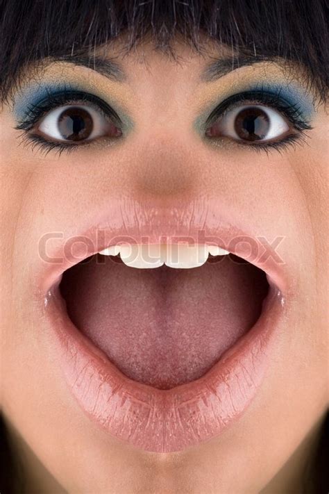 A closeup of a distorted womans face ... | Stock image | Colourbox
