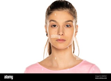 Portrait of young beautiful woman without makeup, and with moles on white background Stock Photo ...