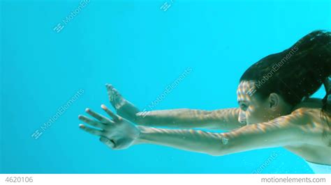 Woman Swimming Underwater Stock video footage | 4620106