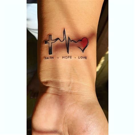 91 Faith Hope Love Tattoo Ideas [2024 Inspiration Guide] | Minimal tattoo, Wrist tattoos for ...