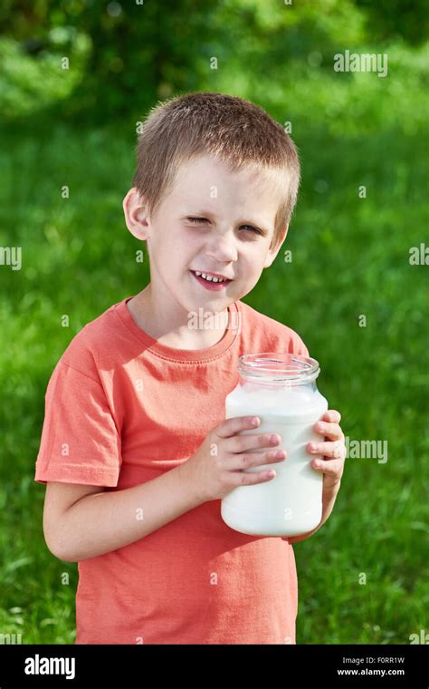 Child drink milk happy hi-res stock photography and images - Alamy