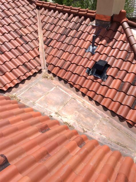 Copper pitch pocket on a Ludowici Spanish clay tile roof. | Clay roof tiles, Clay roofs, Clay tiles