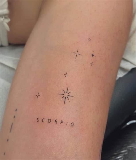 Scorpius constellation tattoo located on the inner arm.