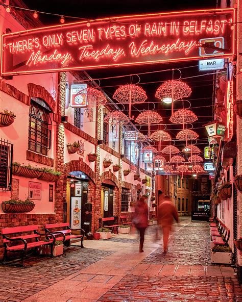 Umbrella Alley in the Cathedral Quarter - Belfast Photograph by Barry O Carroll