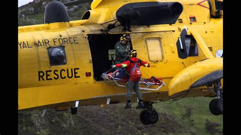 Mountain Rescue Helicopter Uplift of Stretcher - YouTube