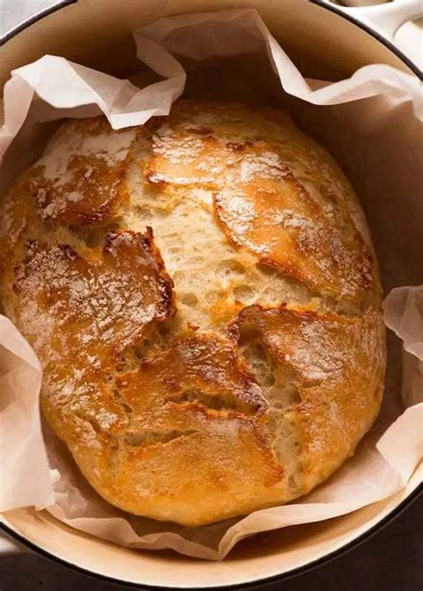 a loaf of bread sitting inside of a pot