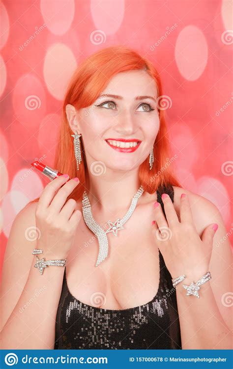 Red-haired Young Woman with Red Lipstick on Christmas Background Alone Stock Photo - Image of ...