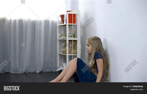 Scared Girl Sitting On Image & Photo (Free Trial) | Bigstock