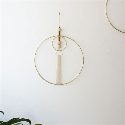 Beautiful brass and natural thread wall hanging with raw wood and vintage brass bead detail ...