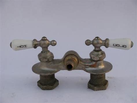 antique claw foot bath tub vintage faucet w/porcelain teardrop taps