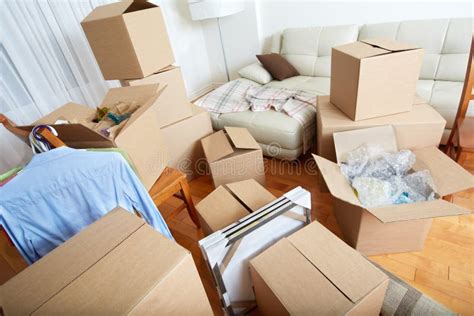 Moving boxes in new house. stock photo. Image of delivery - 88126814