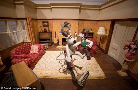 a living room filled with furniture and lots of clutter on top of a rug