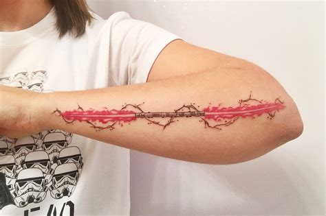 Darth Maul lightsaber tattoo | Lightsaber tattoo, Tattoo fonts, Sith tattoo