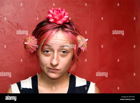 Girl with bows and umbrellas in her hair Stock Photo - Alamy