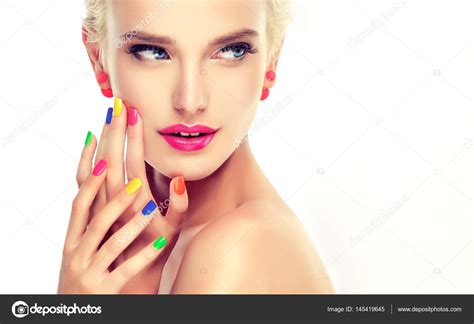 Girl with colorful manicure — Stock Photo © Sofia_Zhuravets #145419645